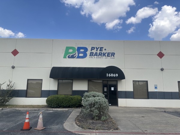Exterior channel-letter sign for Pye Barker on a building front, installed by E&A Signs