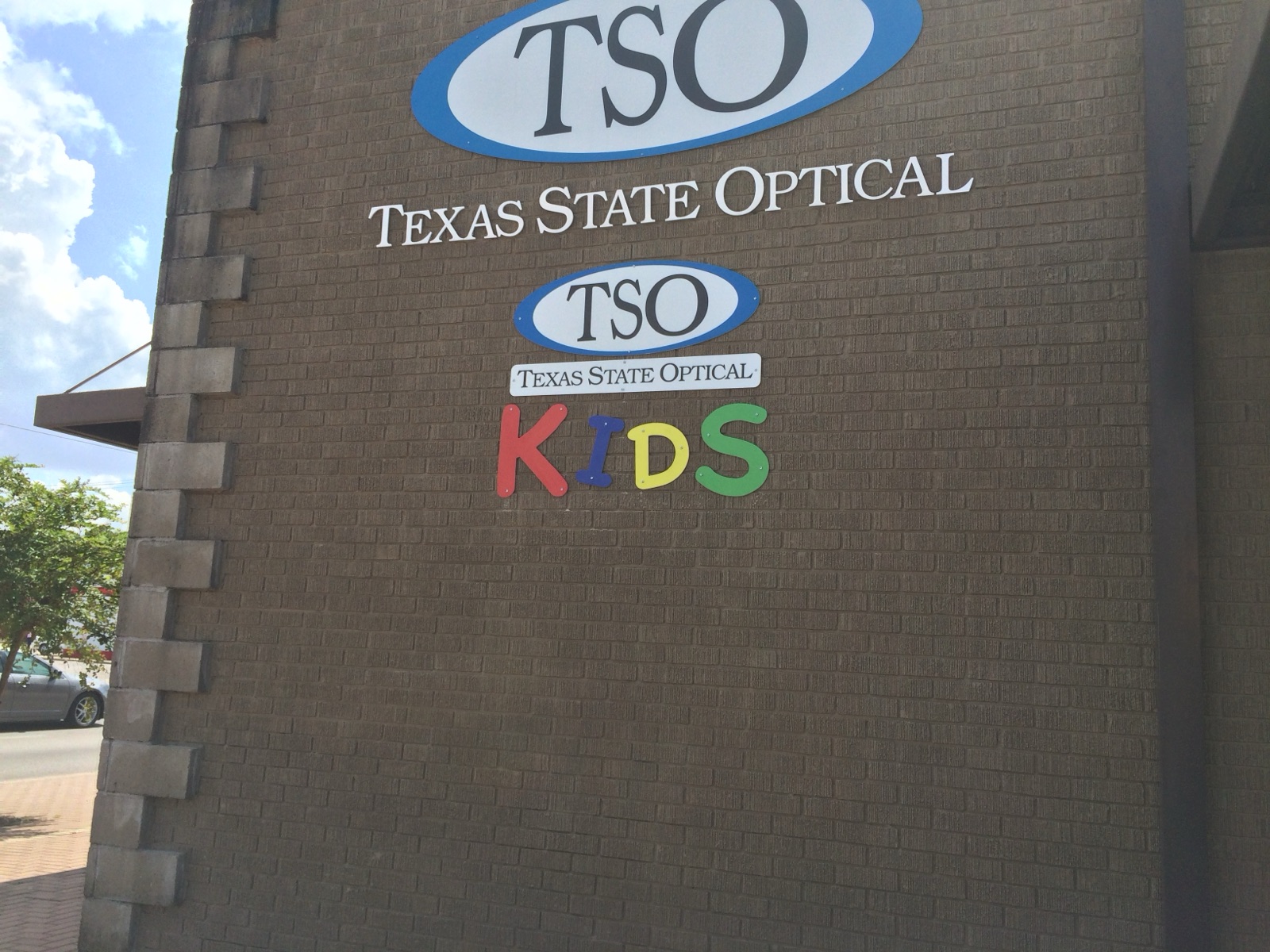 Exterior wall sign for Texas State Optical, installed by E&A Signs