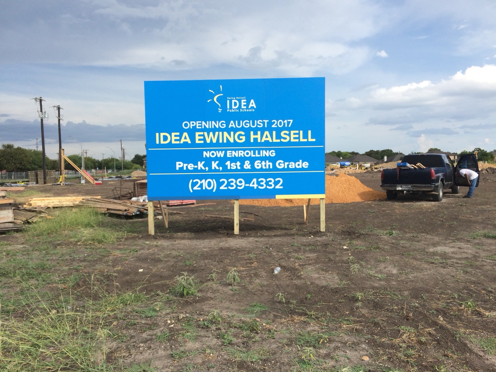 Large exterior enrollment sign for IDEA Ewing Halsell, installed by E&A Signs